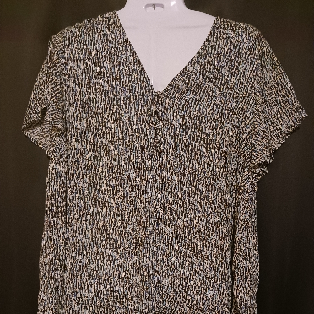 Printed black, blue, white and pink top.